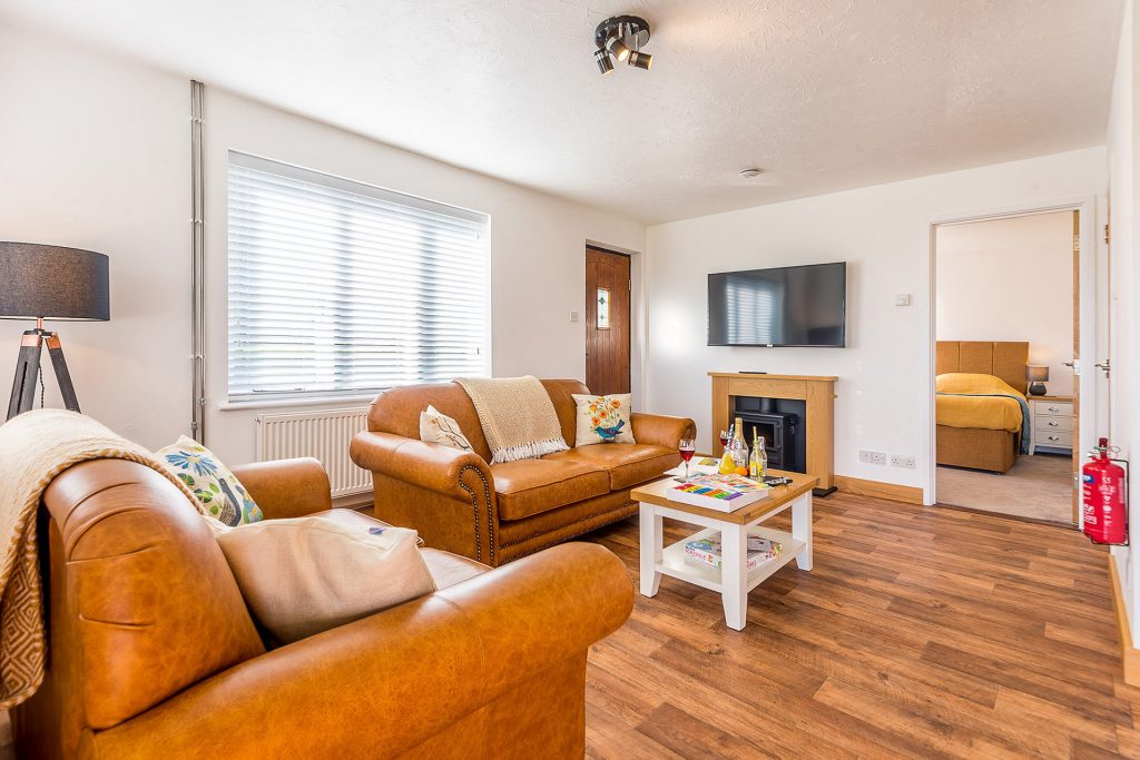Cedar Cottage at St. Tinney Farm Holidays in Cornwall - Lounge area with free WiFi and 50 inch smart TV